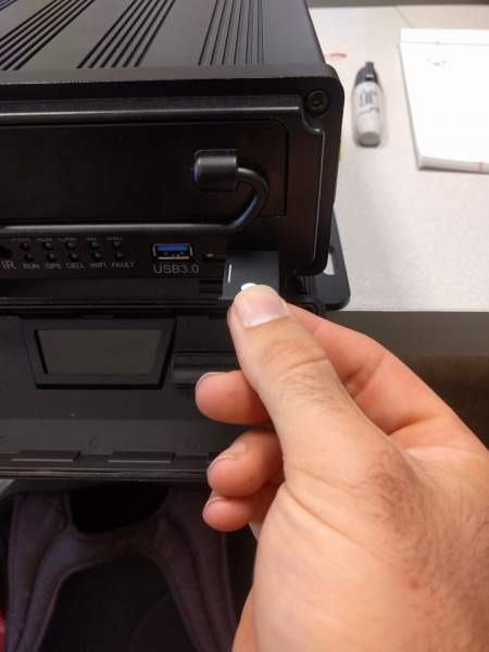 File:Stkm sim tray removal.jpg