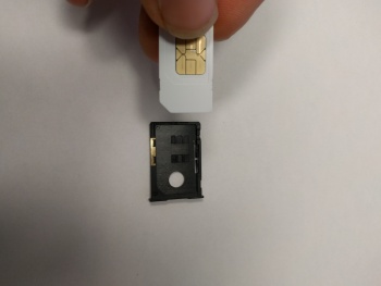 Stkm sim tray insertion 2.jpg